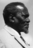 This image of Jomo Kenyatta is licensed under the Creative Commons Attribution-Share Alike 3.0 Germany license. Attribution: Bundesarchiv, B 145 Bild-F021894-0006 / Wegmann, Ludwig / CC-BY-SA